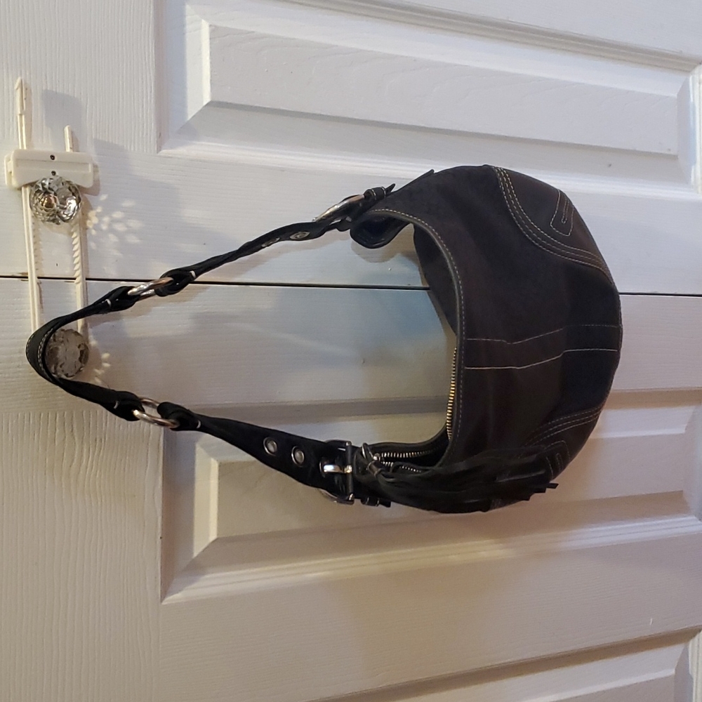 Black signature coach shoulder bag